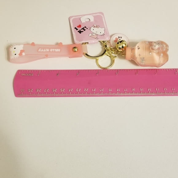 Hello Kitty Key Chain Floating  Oil Liquid Acrylic Bottle Key Chain New - Picture 10 of 10